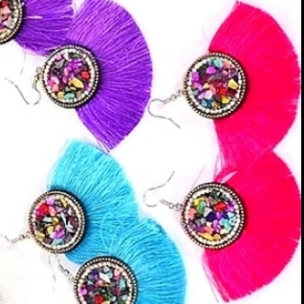Reformation tassel fan